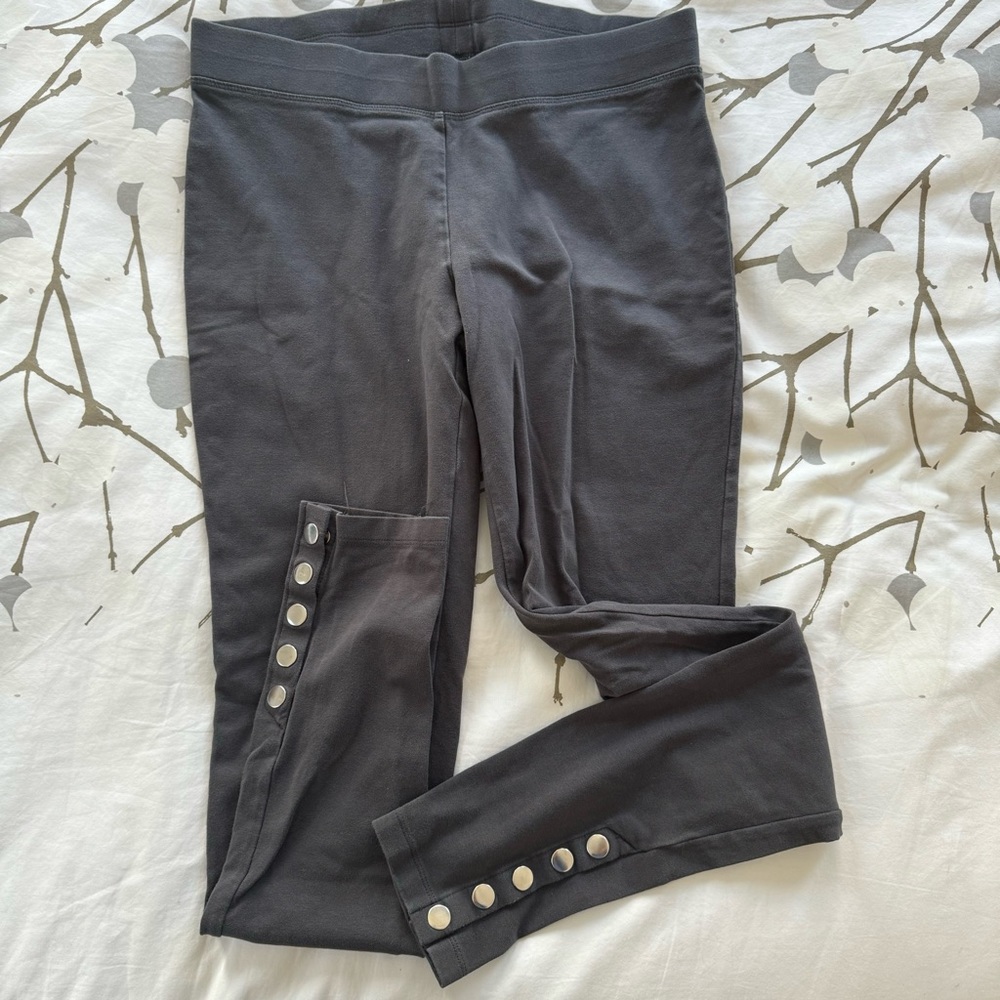 Express sexy stretch grey leggings with button detail at hem.